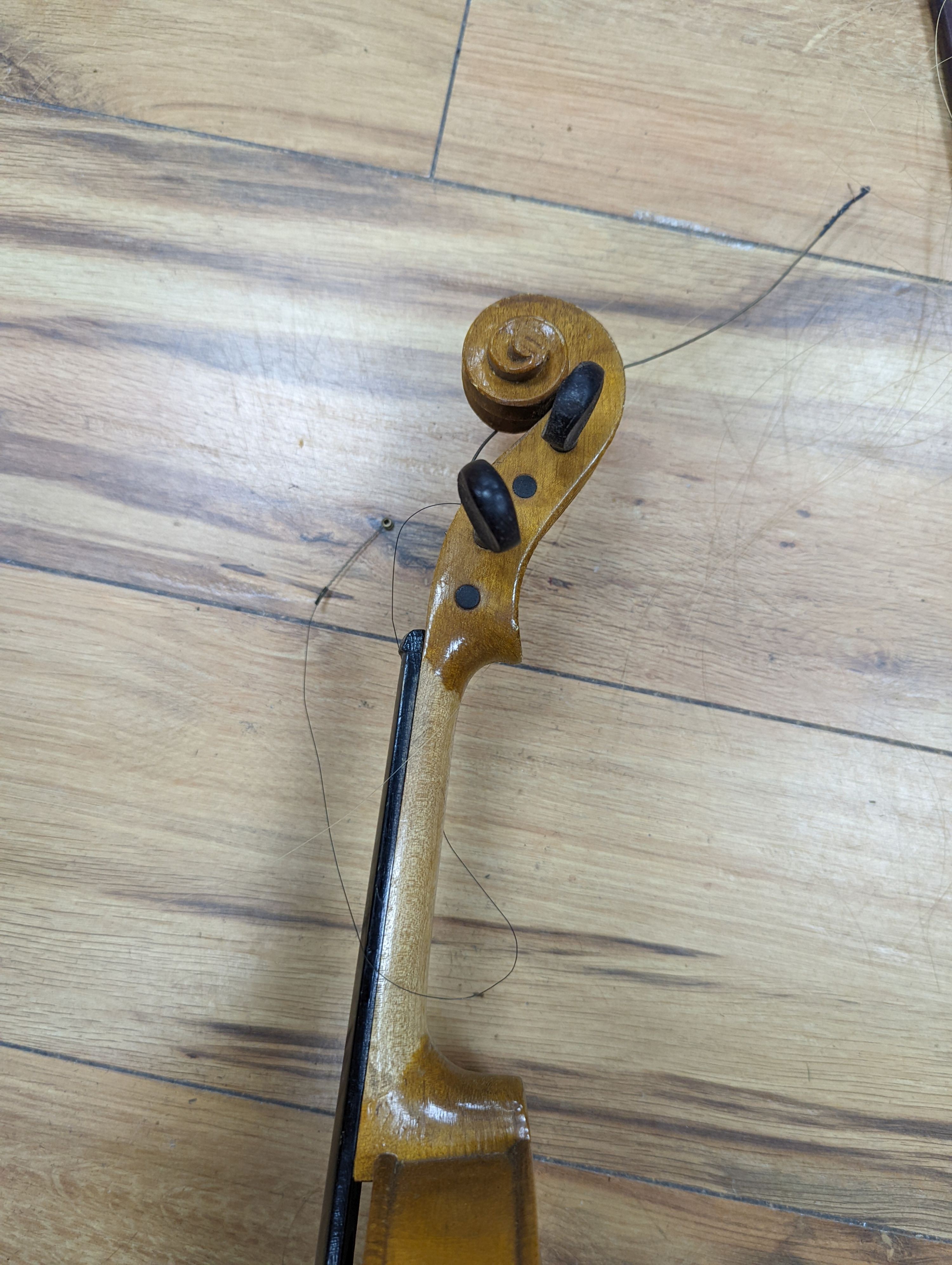 A violin and bow, various records etc
